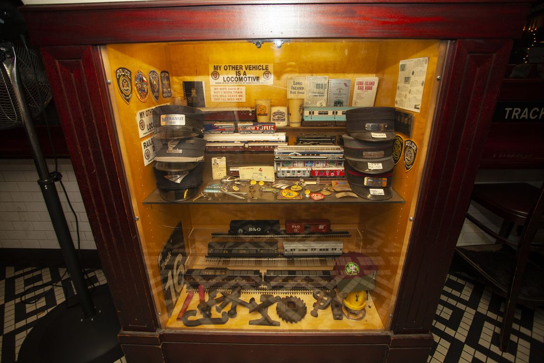 A case of LIRR model train cars and other memorabilia<br>